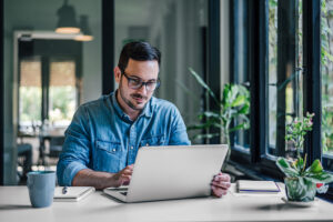 Male looking at computer